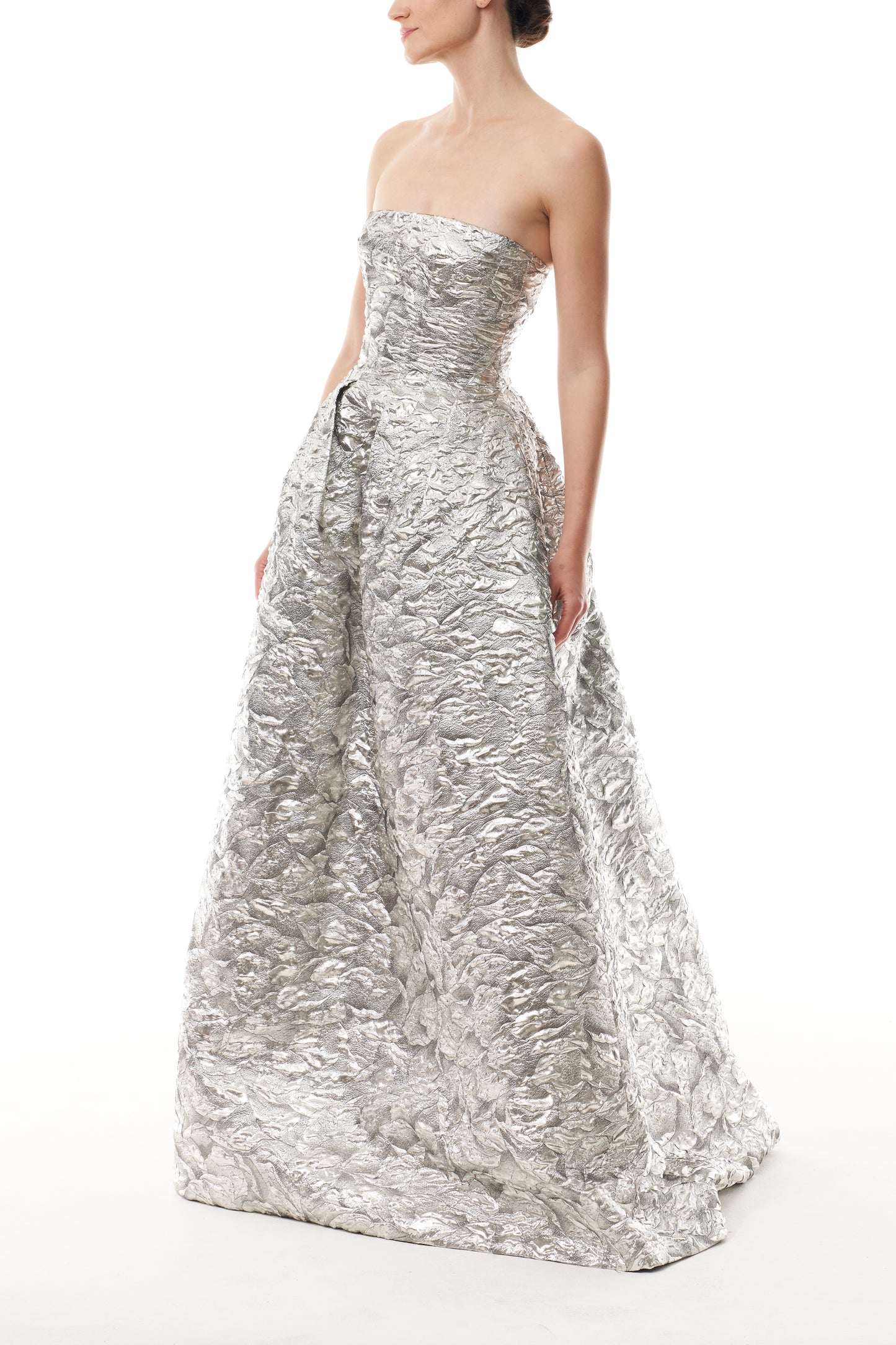 Monique Lhuillier Fall 2025 strapless ballgown in silver metallic jacquard - side.