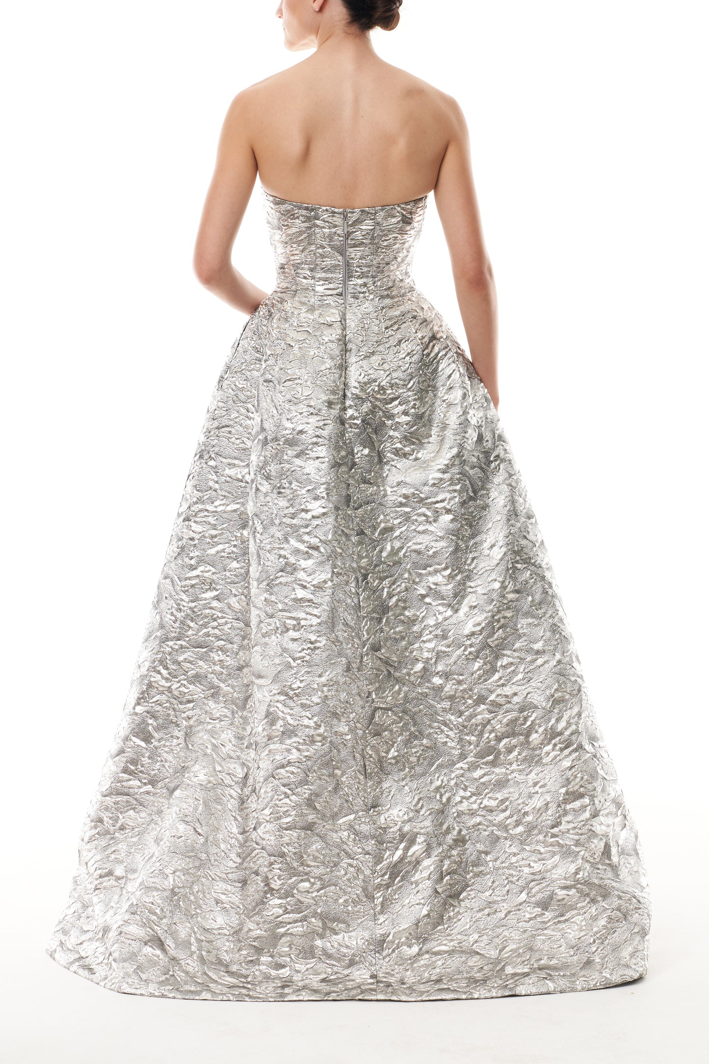 Monique Lhuillier Fall 2025 strapless ballgown in silver metallic jacquard - back.