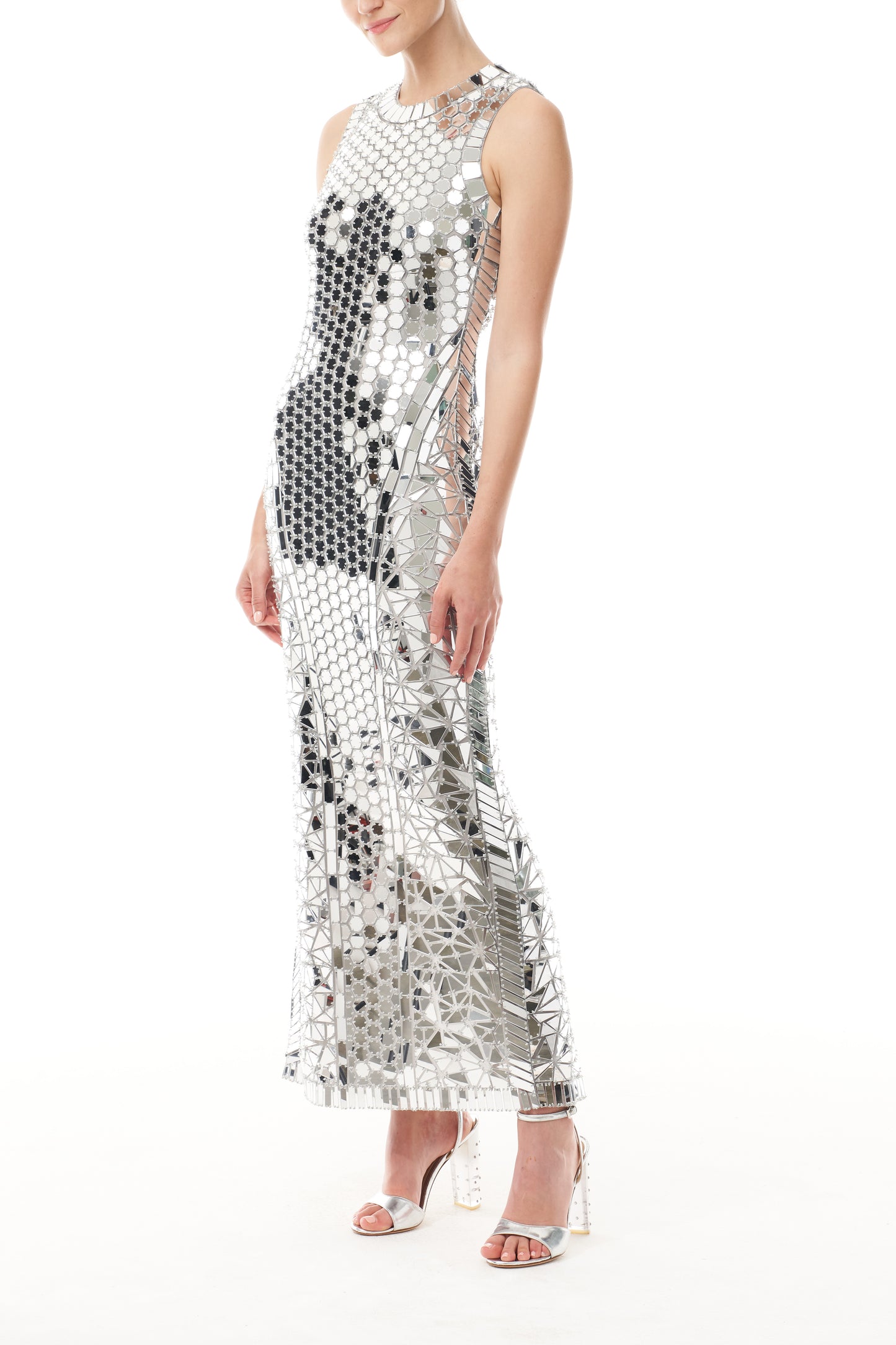 Monique Lhuillier Fall 2025 sleeveless, midi-length shift dress in silver mirrored embroidery - side.