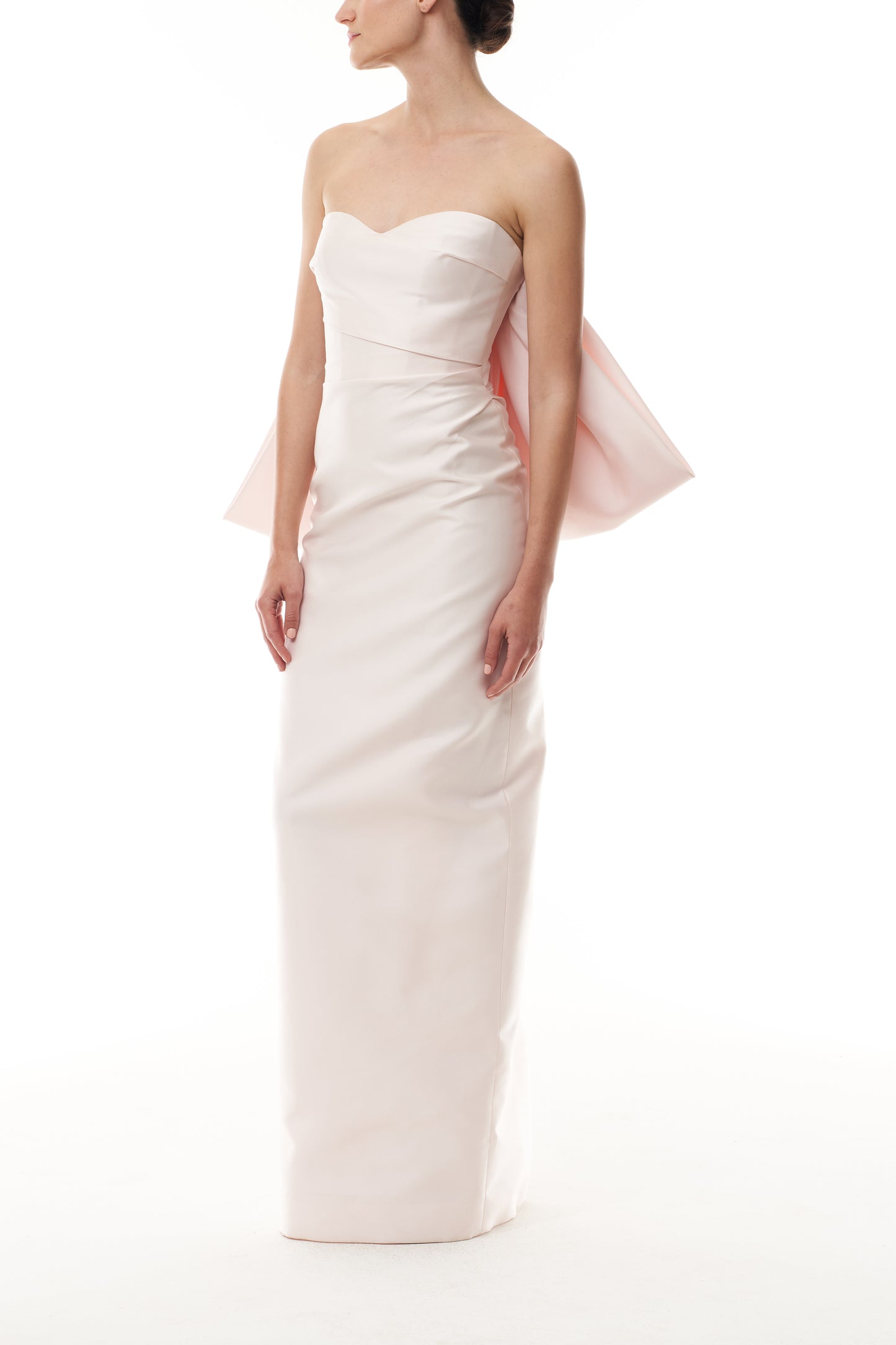 Monique Lhuillier Fall 2025 strapless column gown with sweetheart neckline and back bow draping - side.