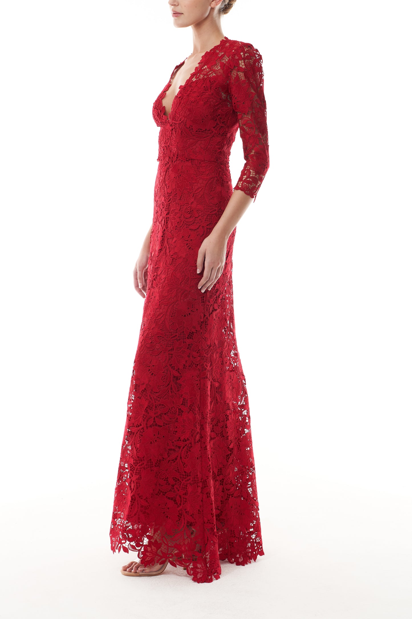 Monique Lhuillier Fall 2025 Siren floral toile lace Deep V neck gown with
¾ sleeve - side.
