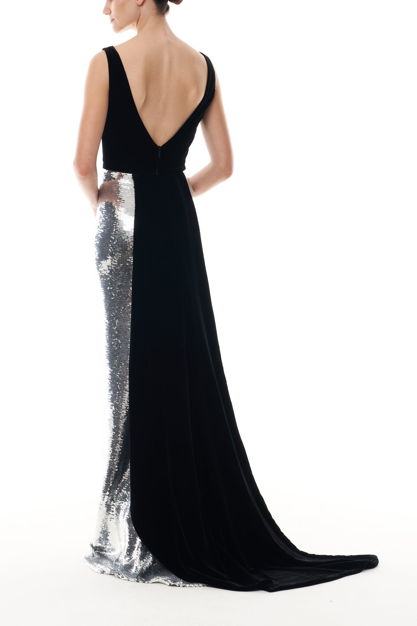 Monique Lhuillier Fall 2025 deep v-neck gown with train in noir velvet and silver sequins - back.