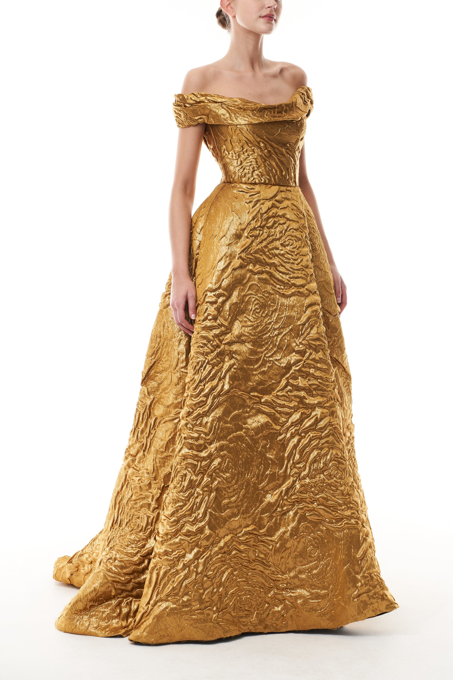 Monique Lhuillier Fall 2025  Gold Lame Rose Jacquard off-the-shoulder ball gown front.