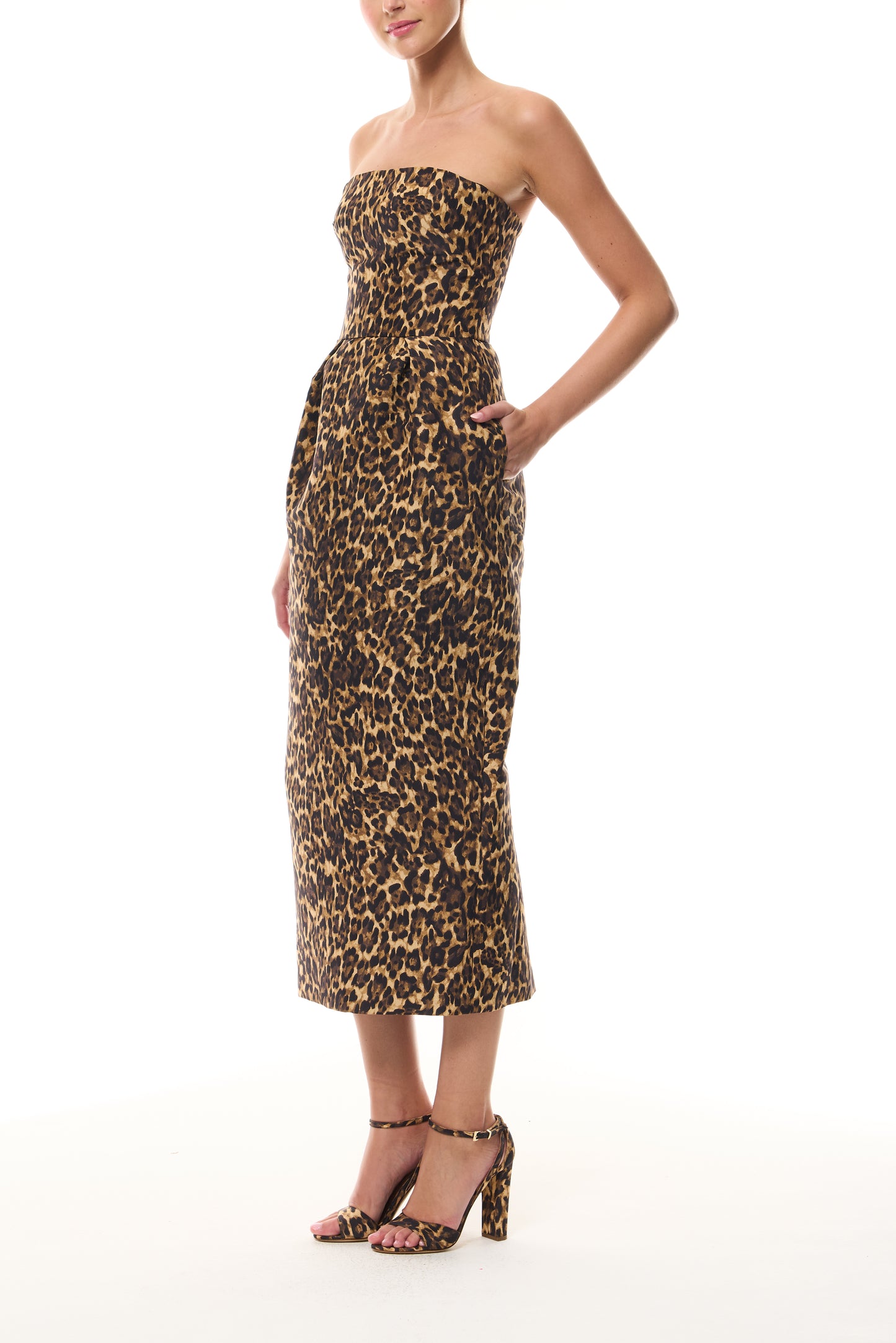 Monique Lhuillier Spring 2026 strapless tea length cocktail dress in Leopard Printed Faille - side.