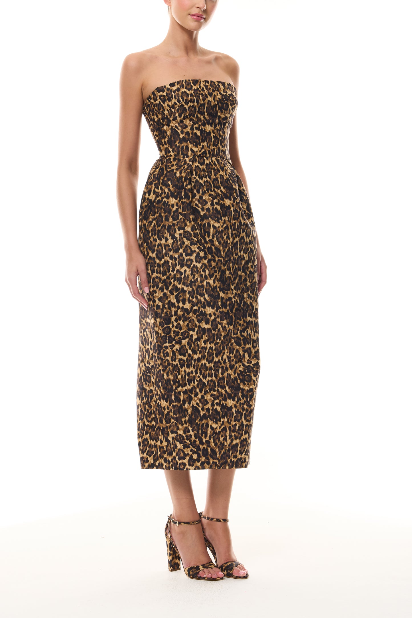 Monique Lhuillier Spring 2026 strapless tea length cocktail dress in Leopard Printed Faille - side.