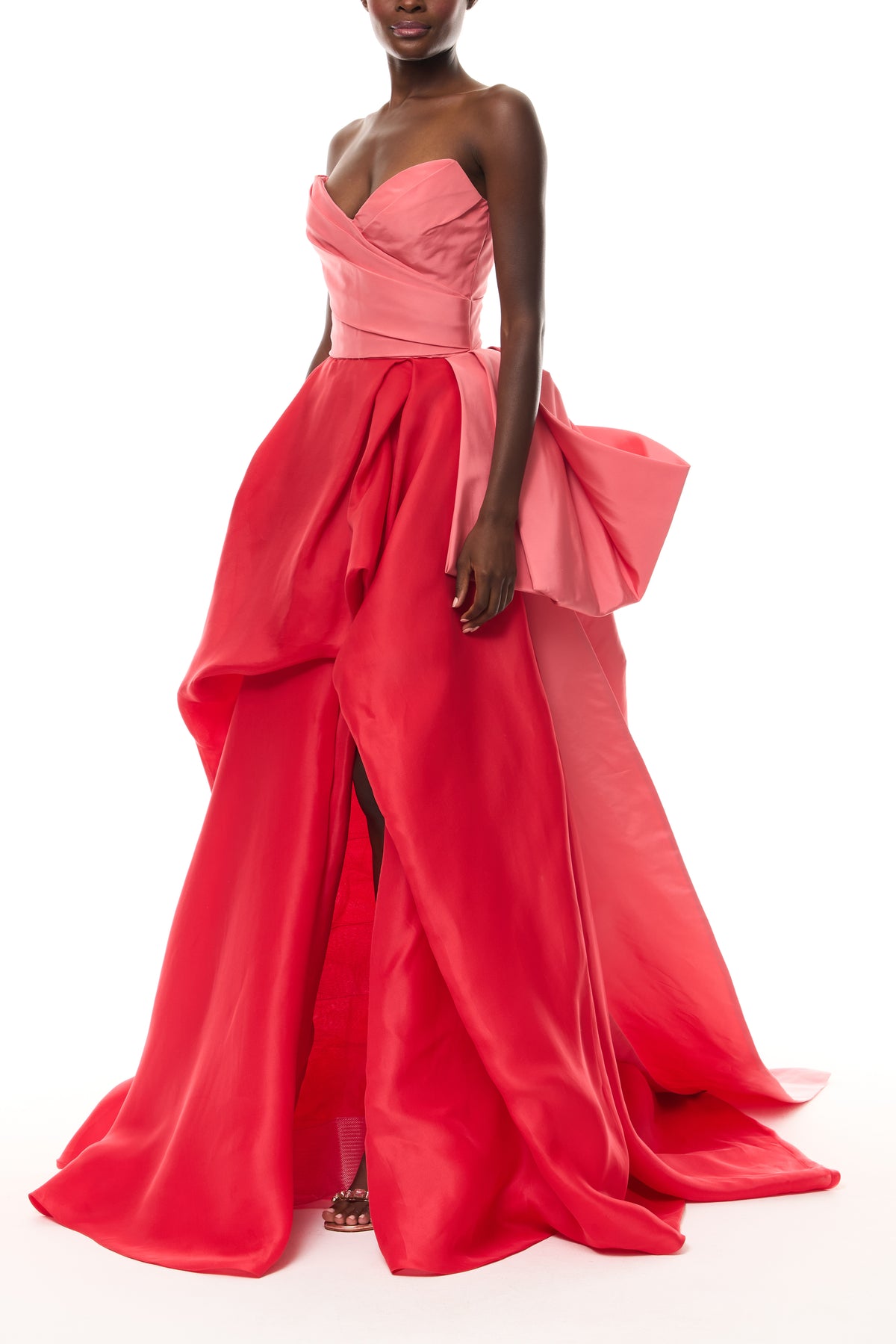 Monique Lhuillier Spring 2026 Plumeria/Poppy Faille/Gazar Strapless draped bodice gown with tufted skirt - side.