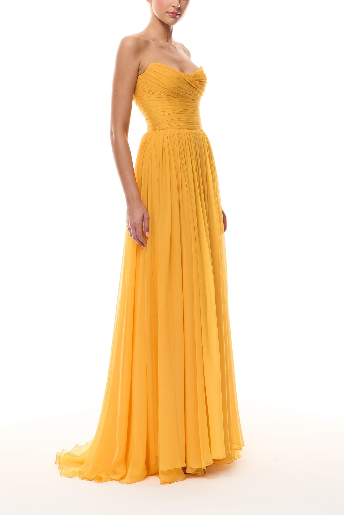 Monique Lhuillier Spring 2026 strapless Mango chiffon draped bodice gown - side.