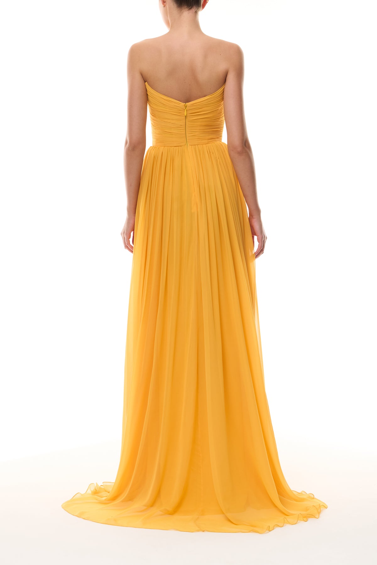 Monique Lhuillier Spring 2026 strapless Mango chiffon draped bodice gown - back.