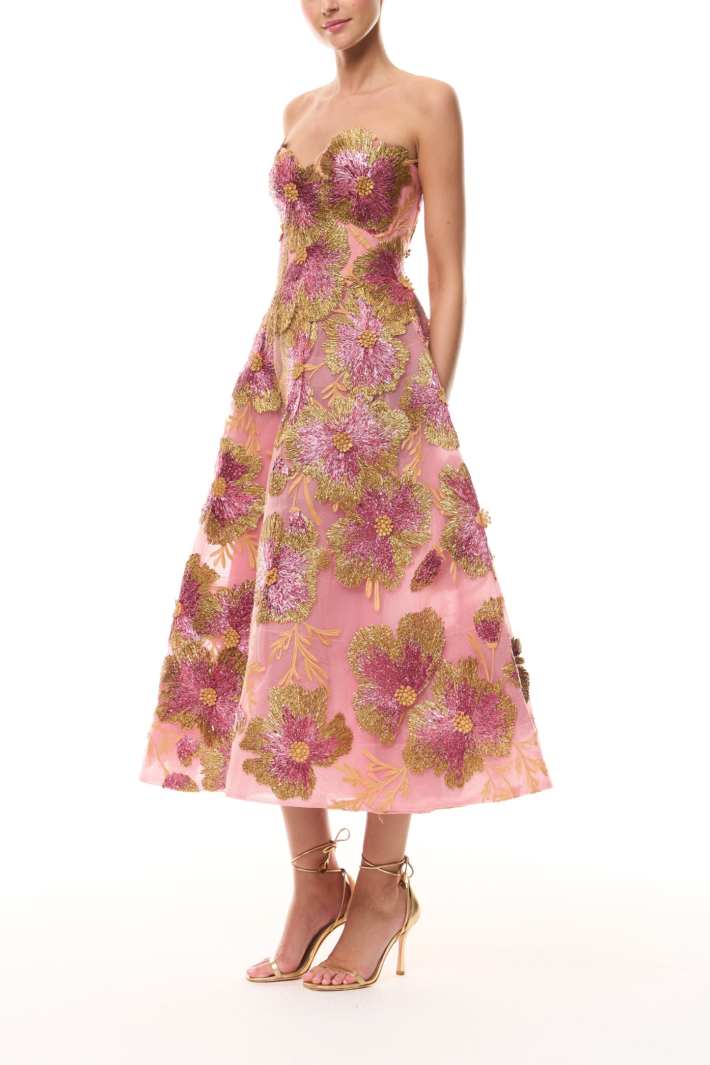 Monique Lhuillier Spring 2026 Plumeria Multi Metallic Raffia Floral Embroidered
Tulle sweetheart tea length cocktail dress - side.
