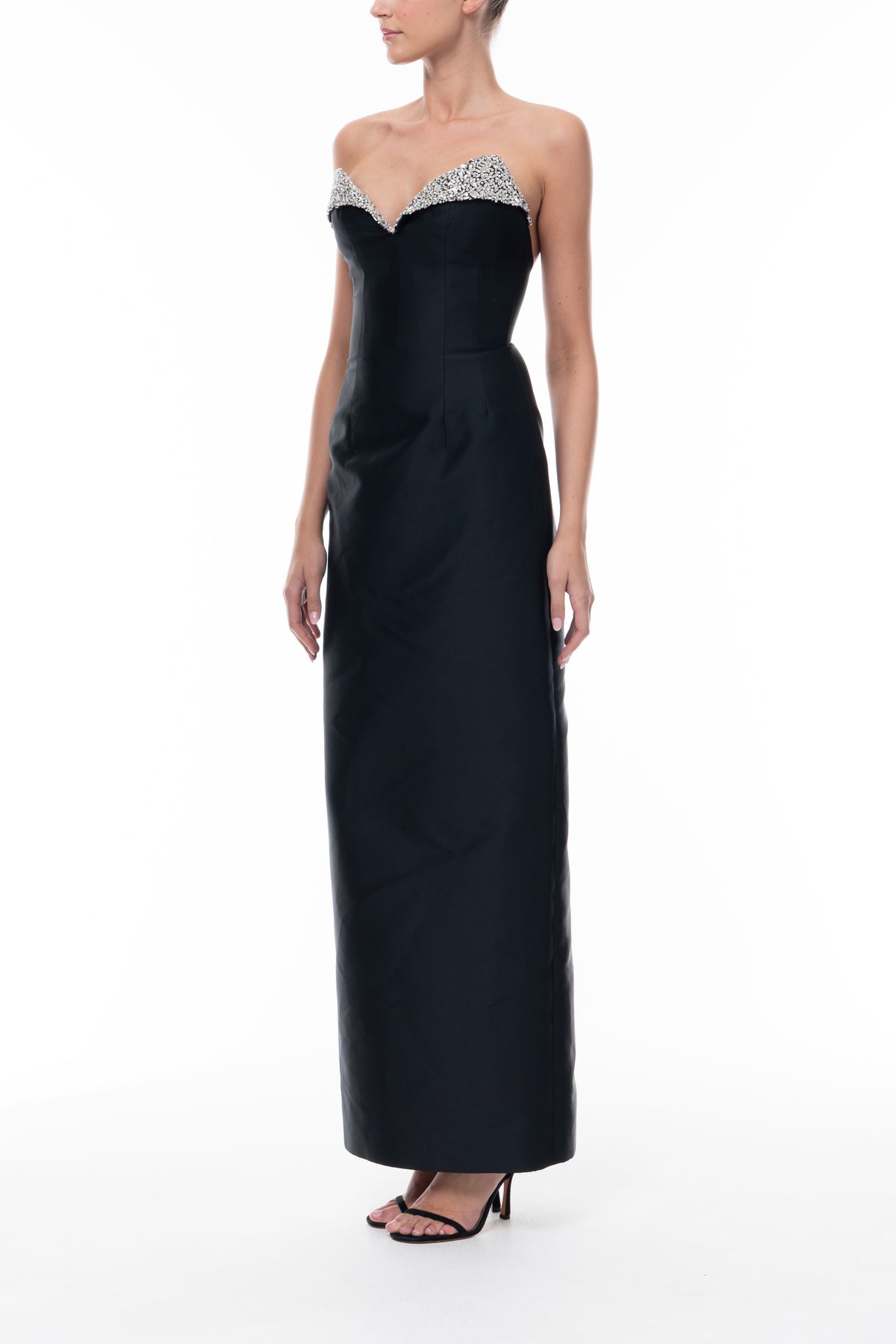 Monique Lhuillier Spring 2026 Noir Mikado Embroidered lapel column gown - side.