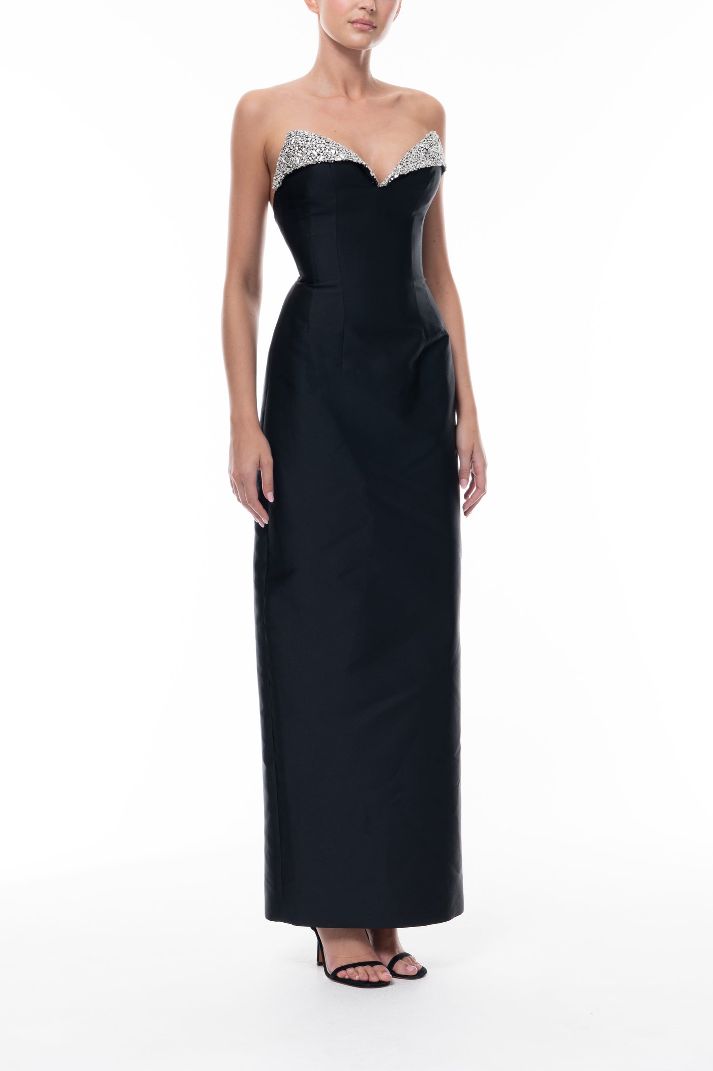 Monique Lhuillier Spring 2026 Noir Mikado Embroidered lapel column gown - side.