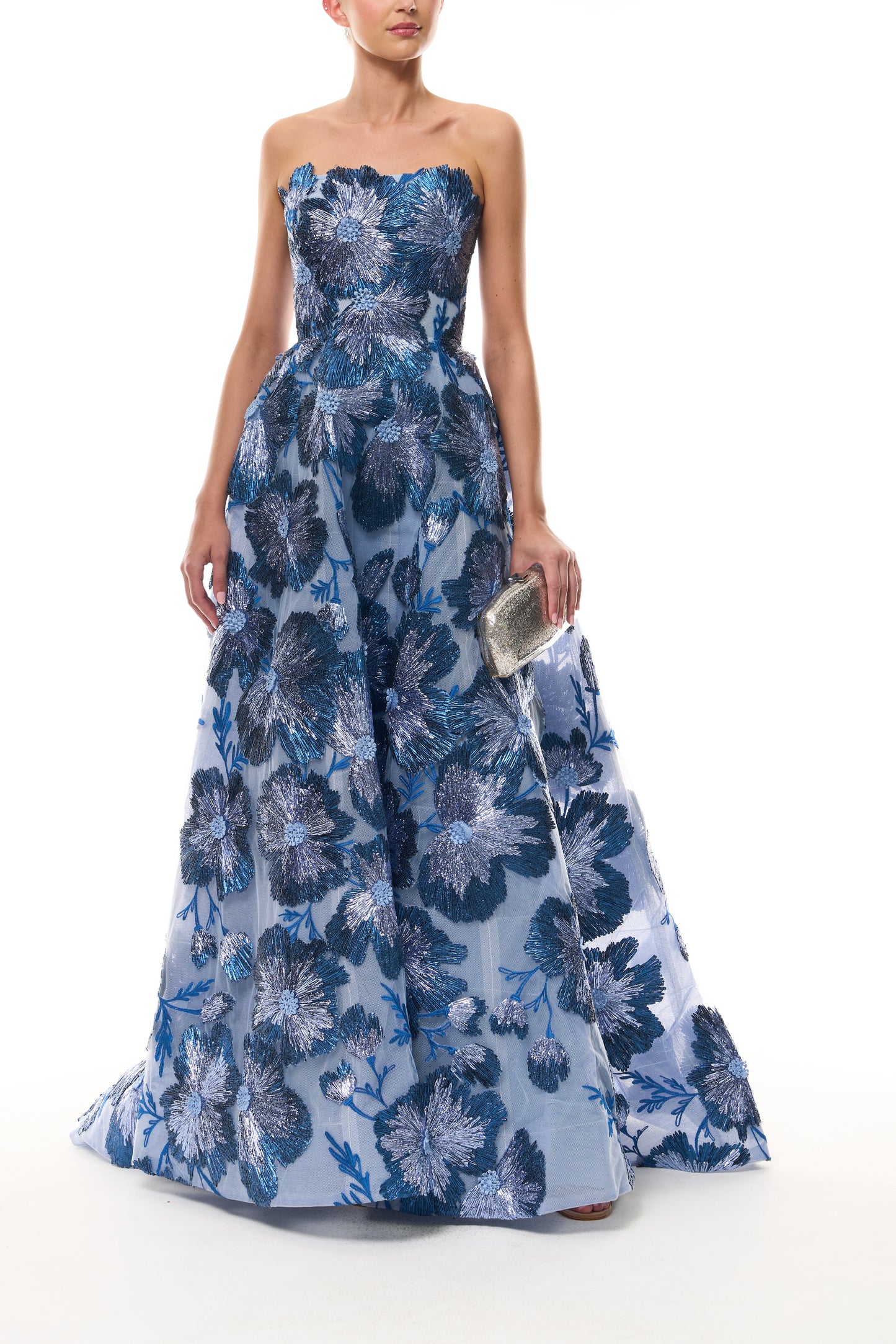 Monique Lhuillier Spring 2026 Lake/Multi Metallic Raffia Floral Embroidered Tulle Strapless ball gown - front with Silver Glitter Viv Minaudière.