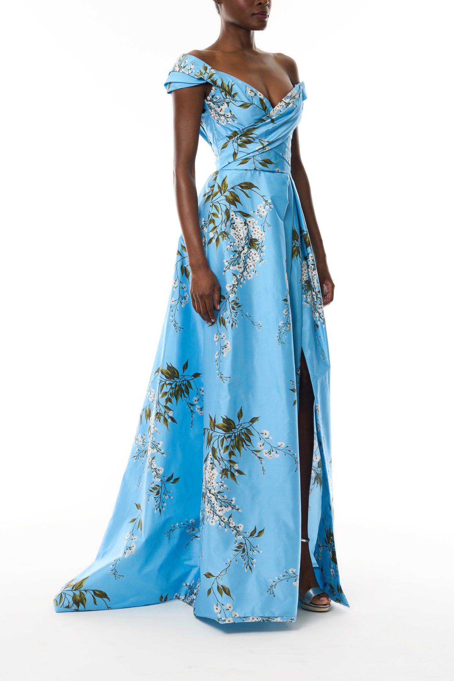 Monique Lhuillier Fall 2026 Horizon Blue Multi Wisteria Printed Taffeta Asymmetric draped bodice ball gown with front slit- side.