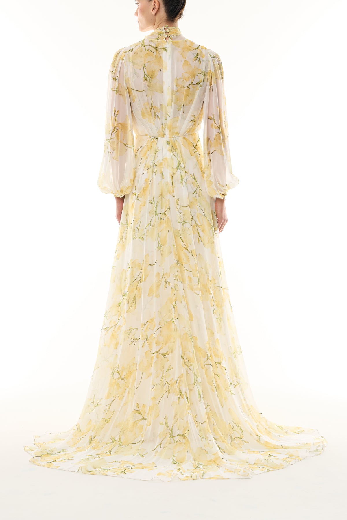 Monique Lhuillier Fall 2026 Pale Yellow/Multi Snapdragon Floral Printed Chiffon Draped V-neck long sleeve gown with blouson sleeves - back.