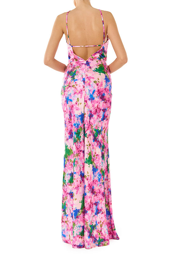 ML Monique Lhuillier Spring 2024 floor length dress with rosette, halter neckline and low V-back in Waterlily Floral crepe-back satin - back.