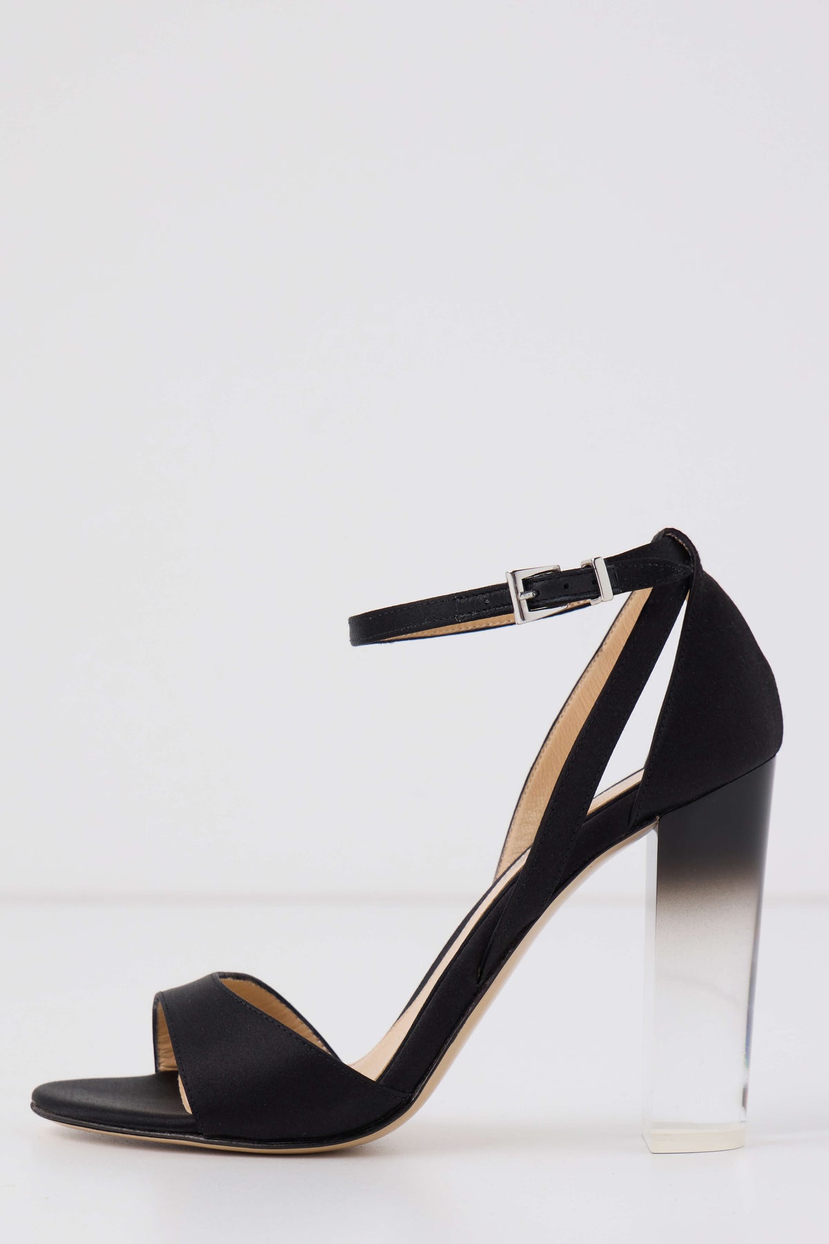 Ava sandal in Noir satin with silver buckle ankle strap and ombre lucite heel - side.