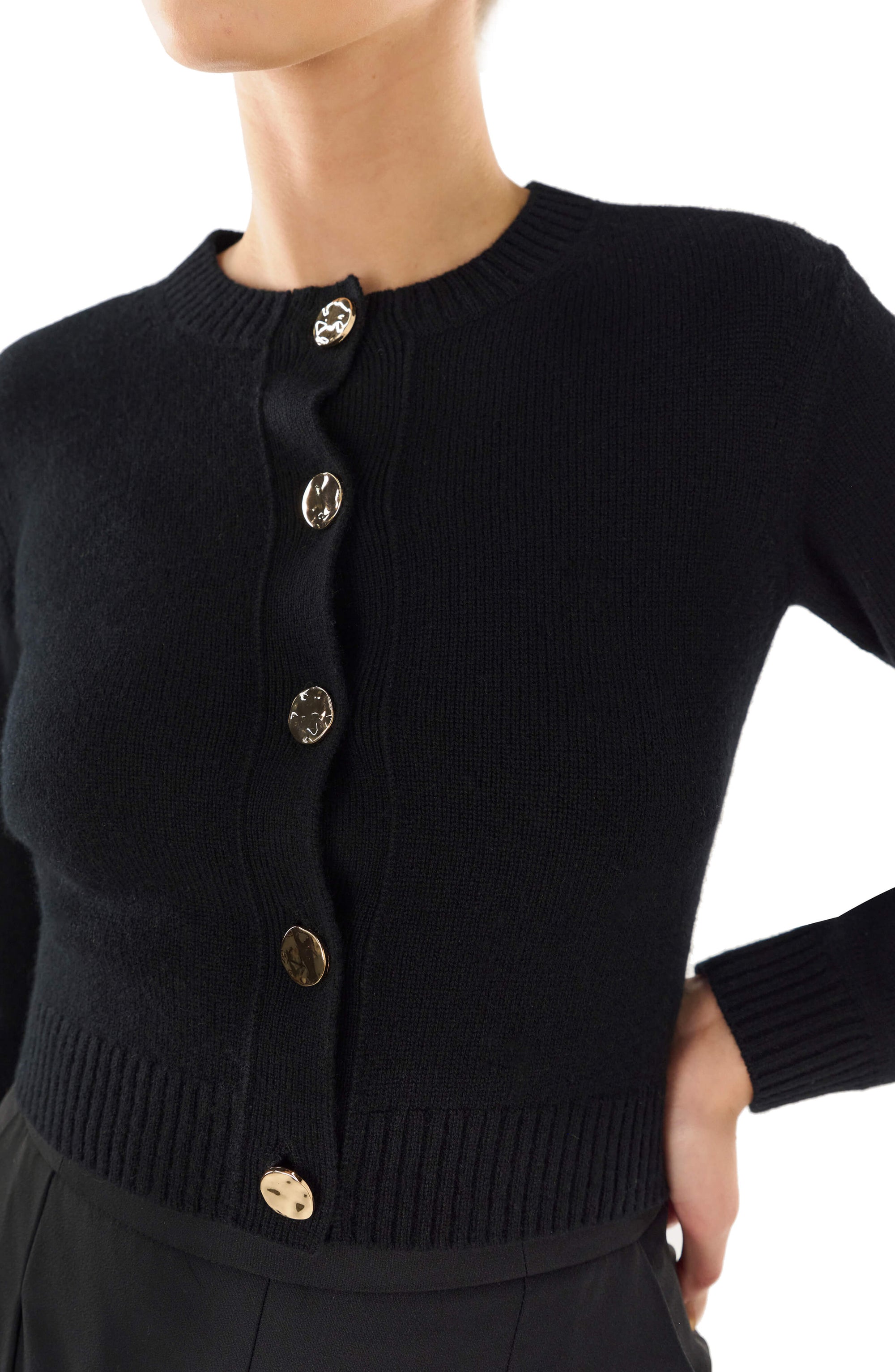 Monique Lhuillier black long sleeve cropped cardigan with gold buttons.