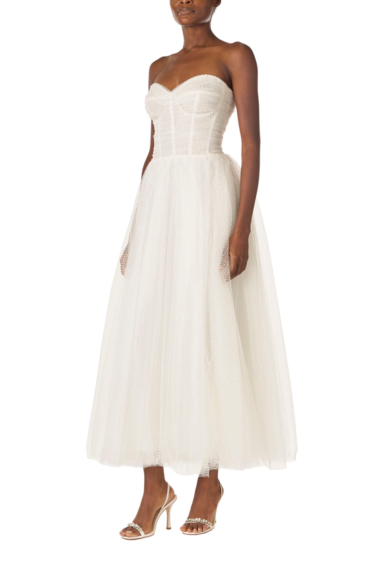 Monique Lhuillier "Brie Dress".
Strapless, tea length dress with sweetheart neckline in French Dot Tulle - left side.