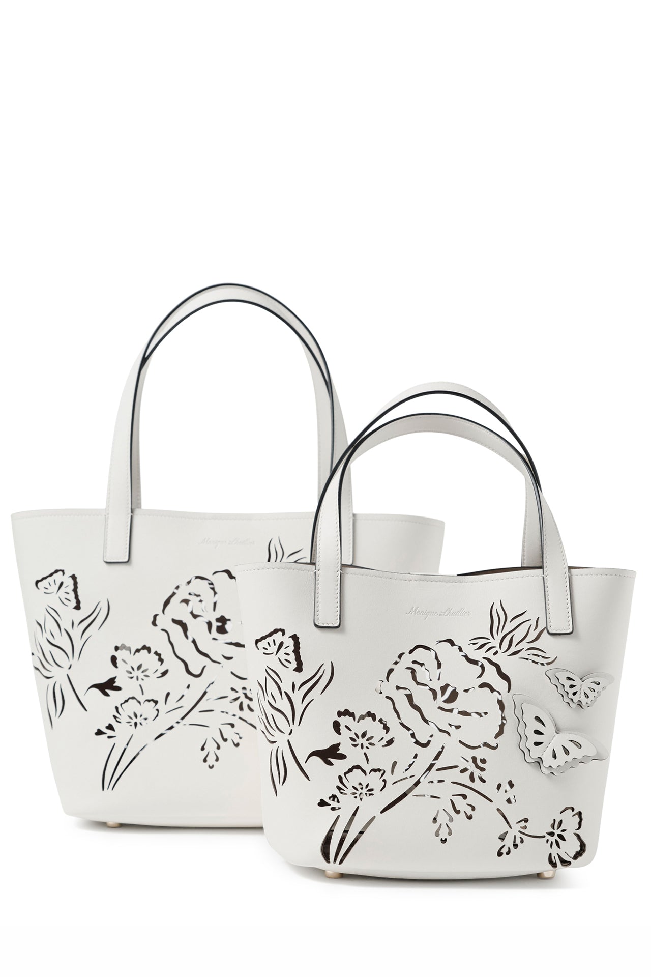Leather top handle mini tote bag with laser cut florals, three-dimensional leather butterflies and small zip pouch in Ivory- front, large and small tote