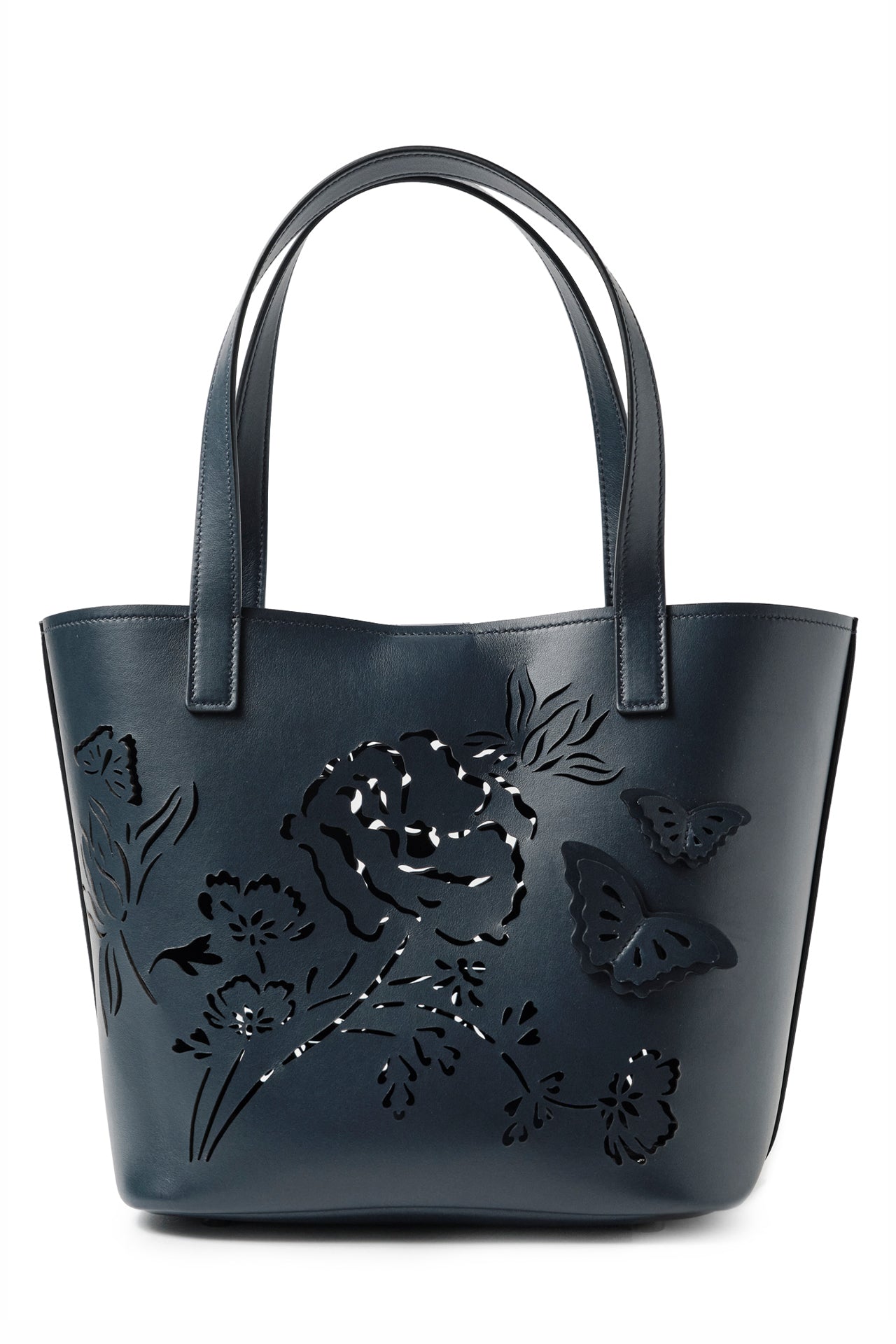 Leather top handle tote bag with laser cut florals, three-dimensional leather butterflies and small zip pouch in Navy- back