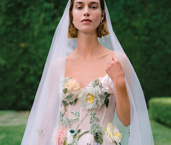Monique Lhuillier Fall 2025 cameo and multicolored floral Amalfi ballgown with 3D applique and tulle veil on model outside