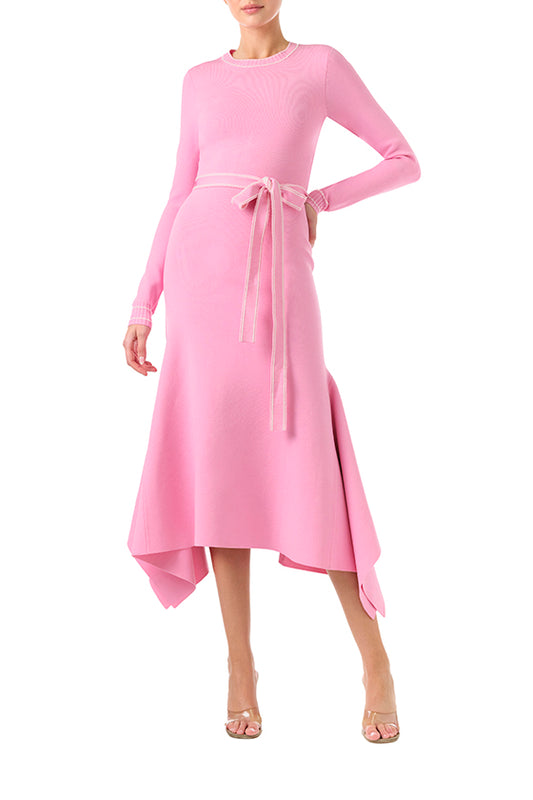 Monique Lhuillier Fall 2024 pink knit long sleeve dress with handkerchief hem and self-tie belt - front.