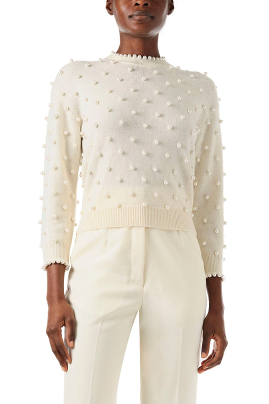 Monique Lhuillier Fall 2024 creme cashmere long sleeve sweater with pearl embroidery and trim - front.
