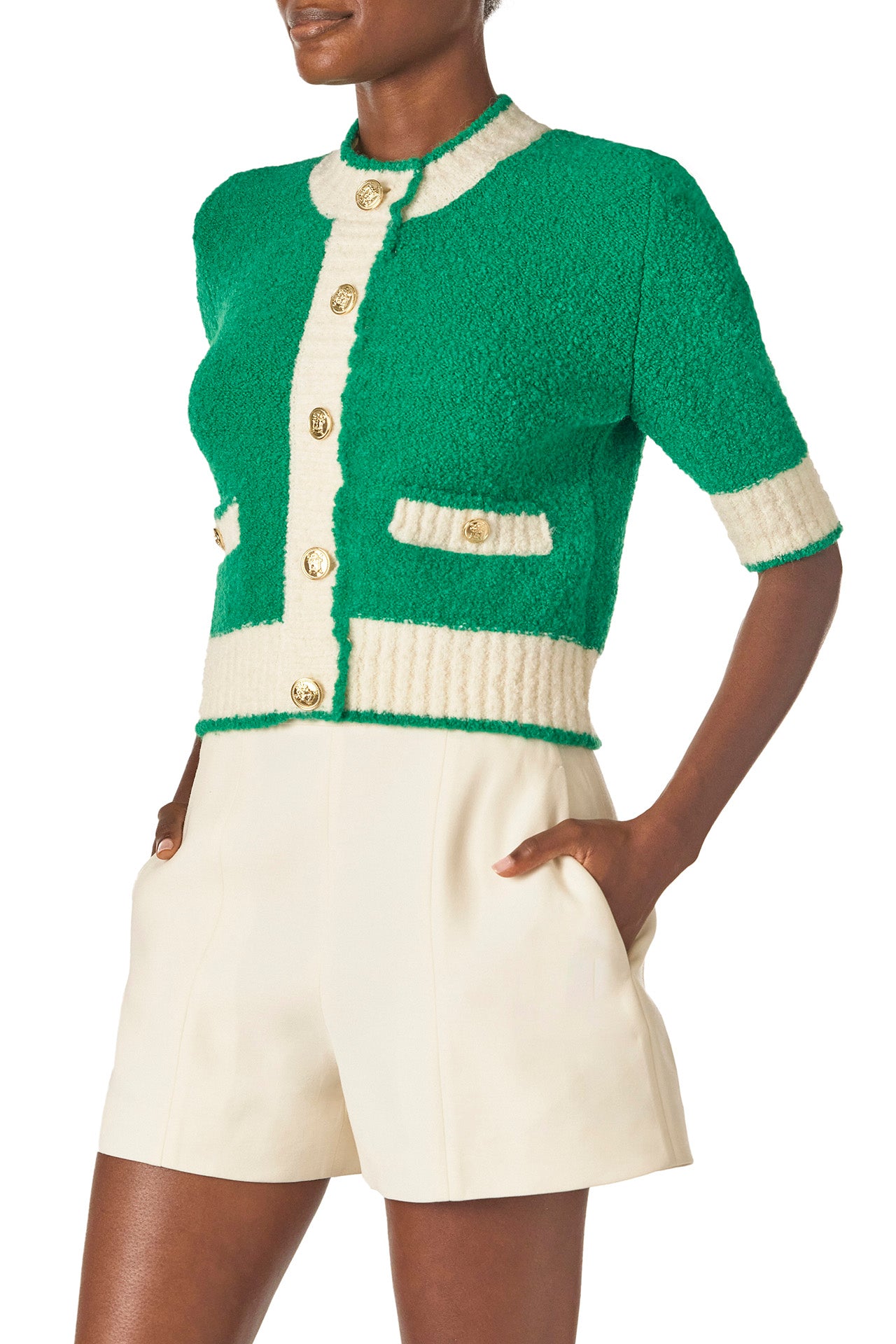 Monique Lhuillier Spring 2025 Short sleeve knit cardigan in Grass/Silk White Boucle - left side.