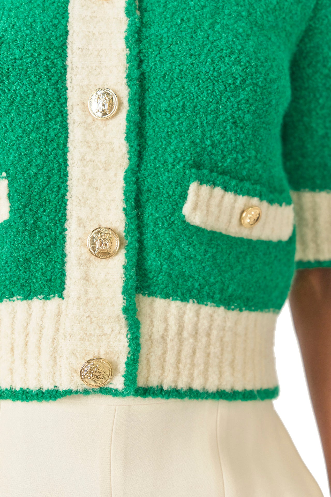 Monique Lhuillier Spring 2025 Short sleeve knit cardigan in Grass/Silk White Boucle - fabric.