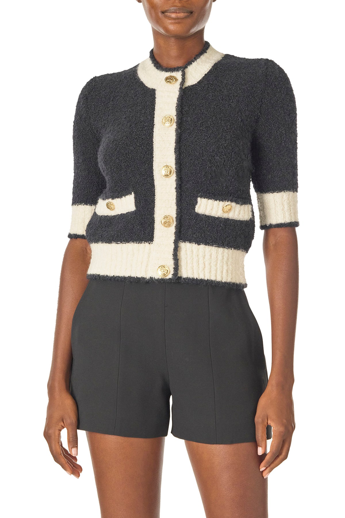 Monique Lhuillier Spring 2025 Short sleeve knit cardigan in Noir/Silk White Boucle - front.