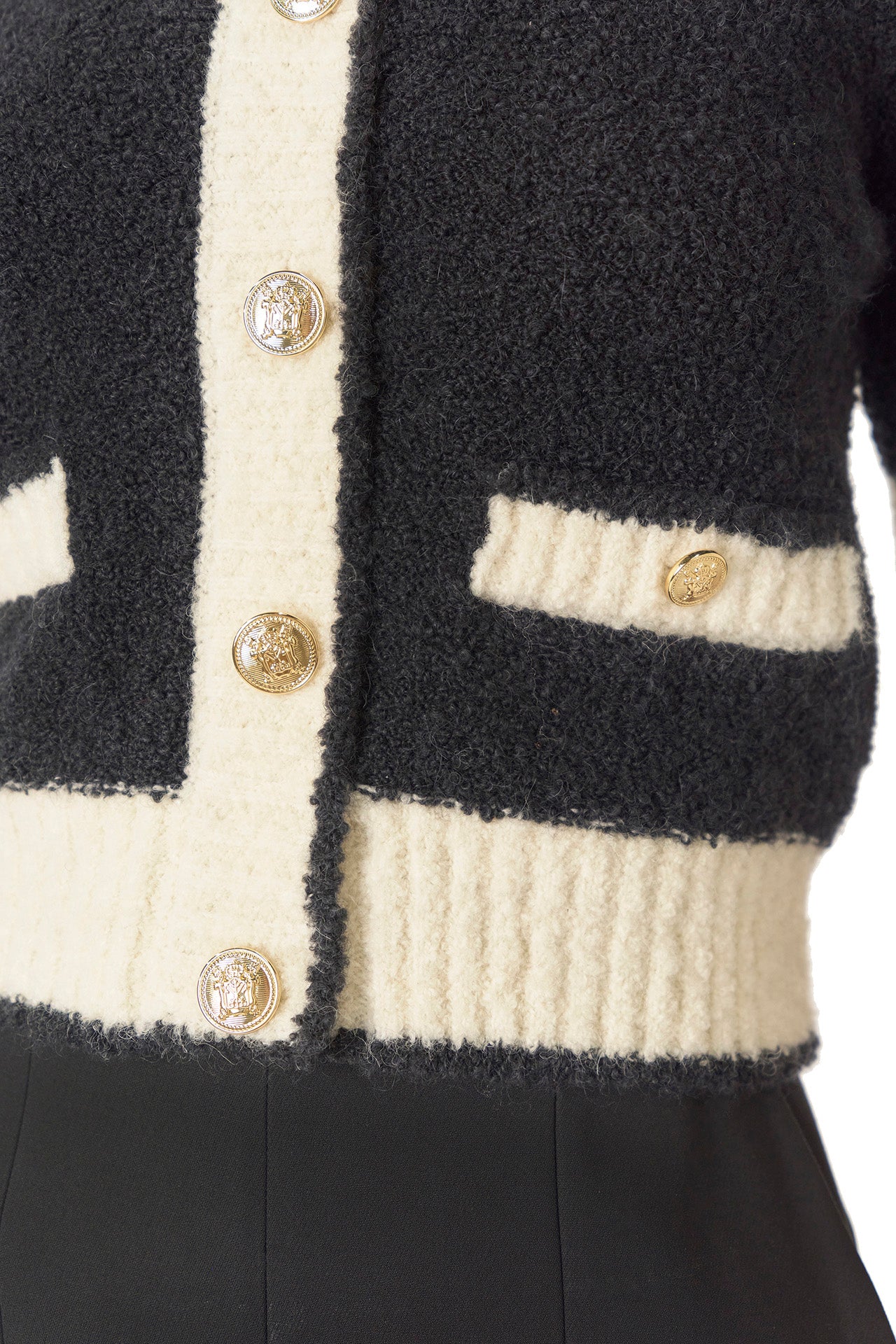 Monique Lhuillier Spring 2025 Short sleeve knit cardigan in Noir/Silk White Boucle - buttons.