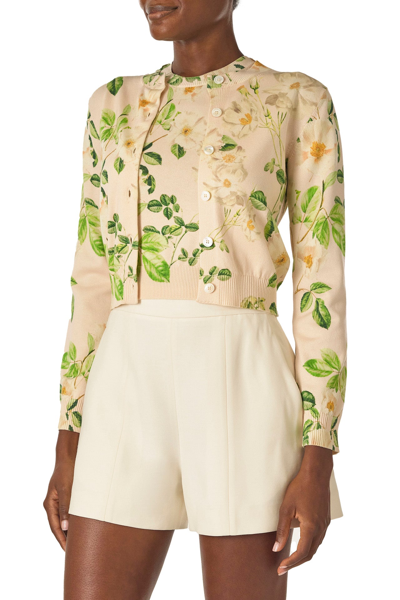 Monique Lhuillier Spring 2025 rose printed knit long sleeve cardigan with button center front closure in Bellini Multi - side.