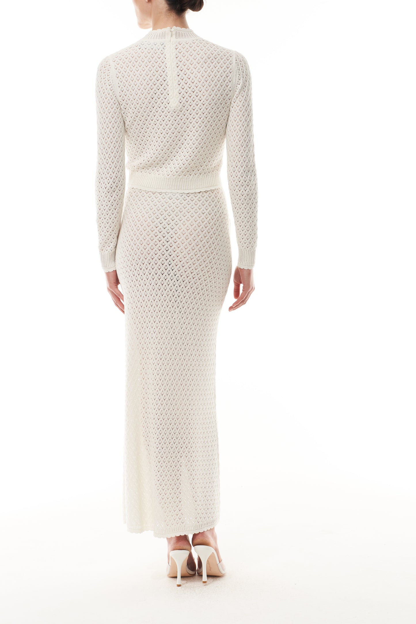 Monique Lhuillier Fall 2025 cotton diamond lace knit long sleeve top and midi skirt- back.