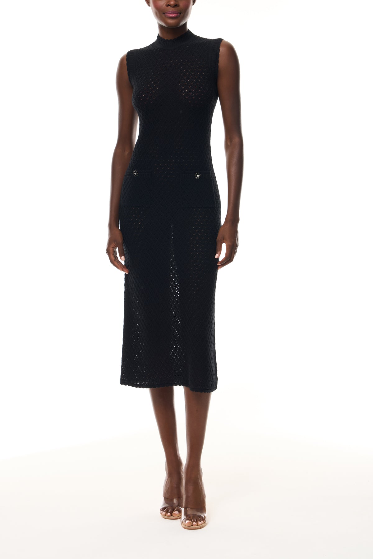 Monique Lhuillier Fall 2025 RTW Noir Sleeveless Shift Dress in Cotton Diamond Lace knit with two front pockets - front.