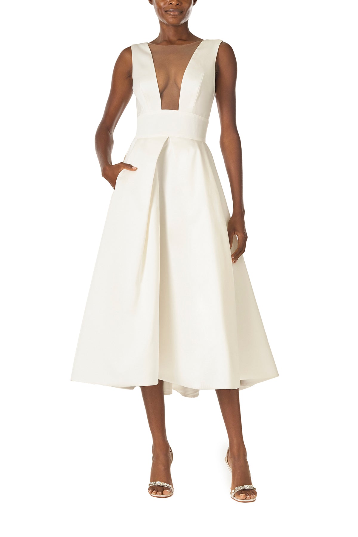 Monique Lhuillier "Kennedy" V-neck cocktail dress in Silk White Mikado fabric with pockets and nude illusion tulle at neckline - front.