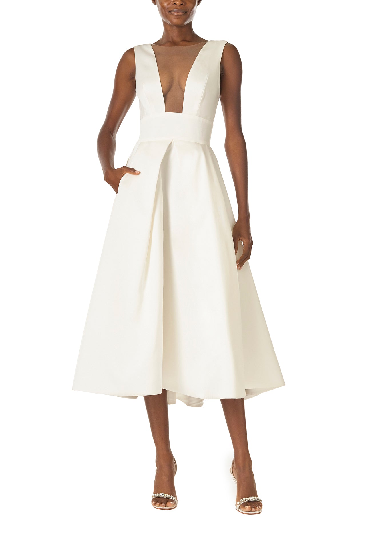 Monique Lhuillier "Kennedy" V-neck cocktail dress in Silk White Mikado fabric with pockets and nude illusion tulle at neckline - front.