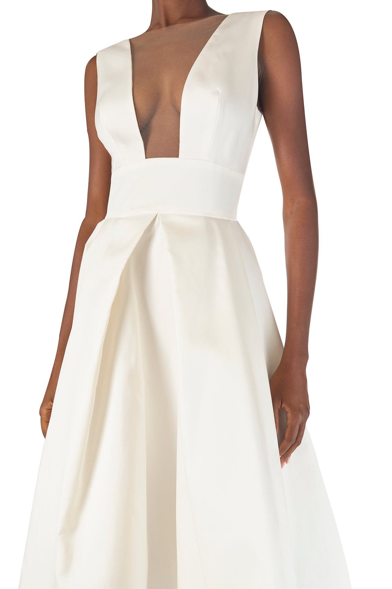 Monique Lhuillier "Kennedy" V-neck cocktail dress in Silk White Mikado fabric with pockets and nude illusion tulle at neckline - detail.