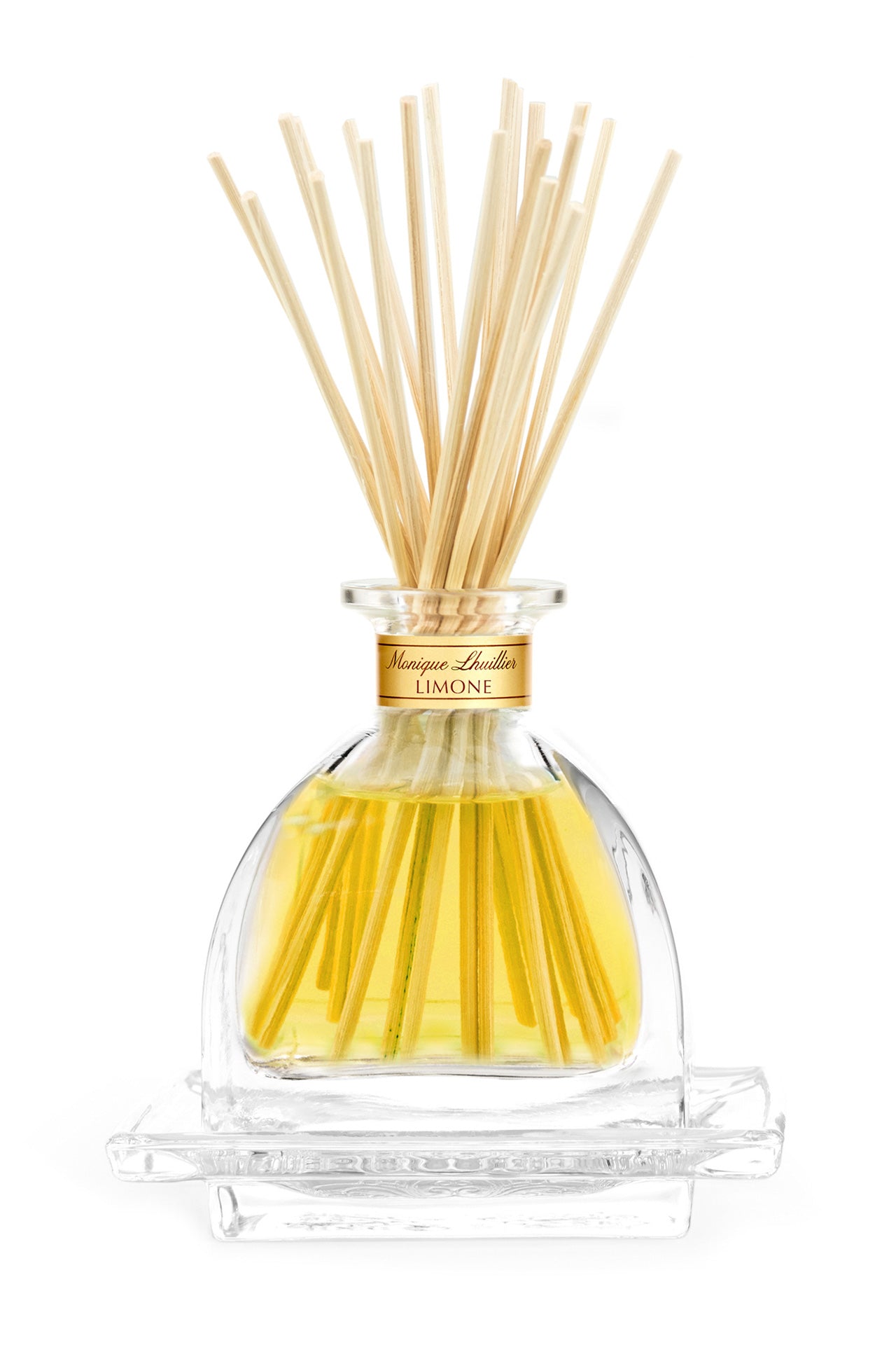 Monique Lhuillier Limone Diffuser with peony sola flowers.