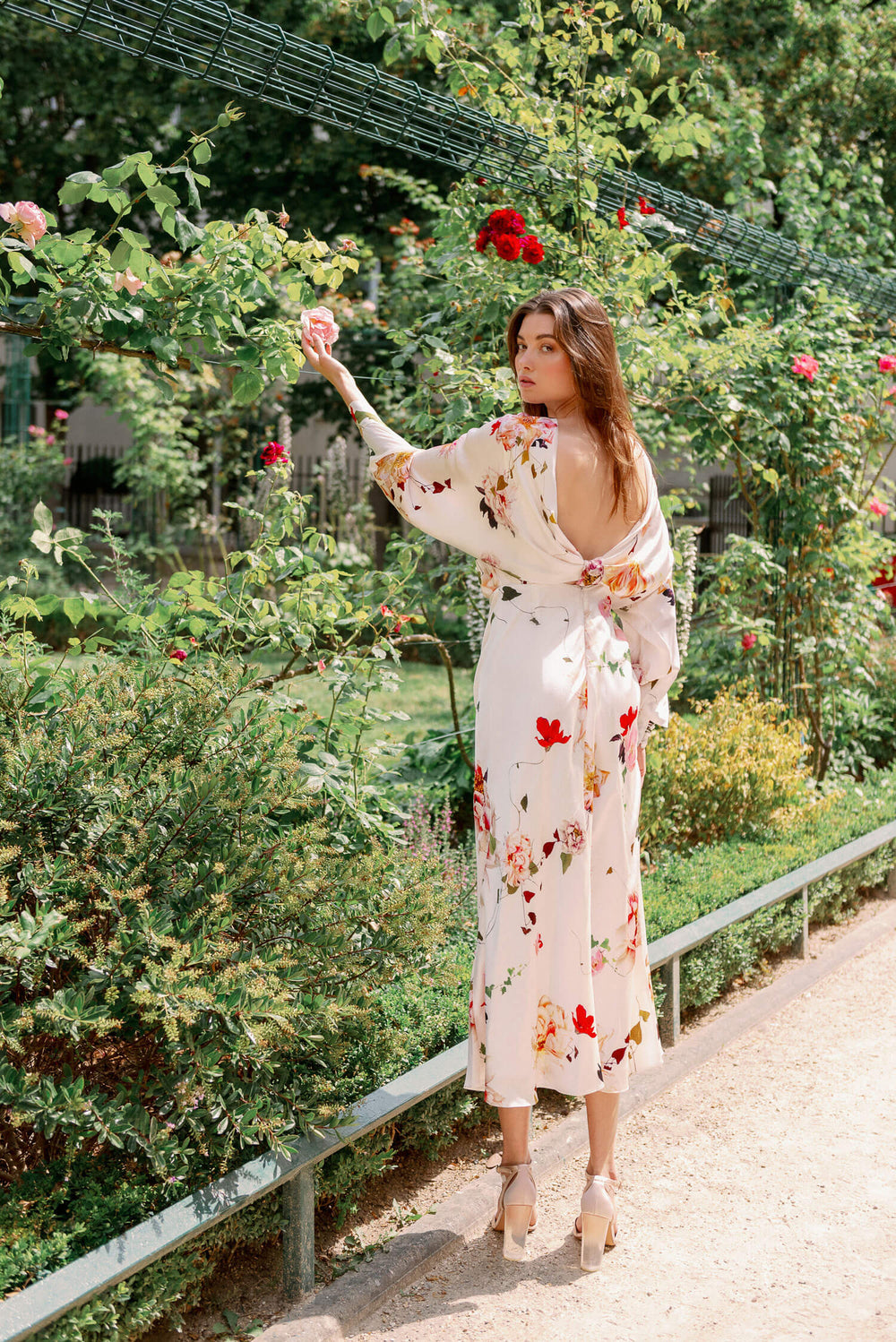 Monique Lhuillier Spring 2024 Blouson Long Sleeve Floral Dress in silk white.