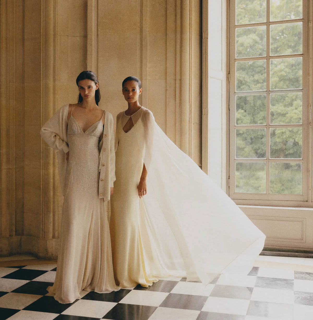 Ivory and silver embroidered chiffon slip gown with cream sweater. Embroidered spaghetti strap slip gown in Creme crepe back satin with chiffon evening cape. - lookbook