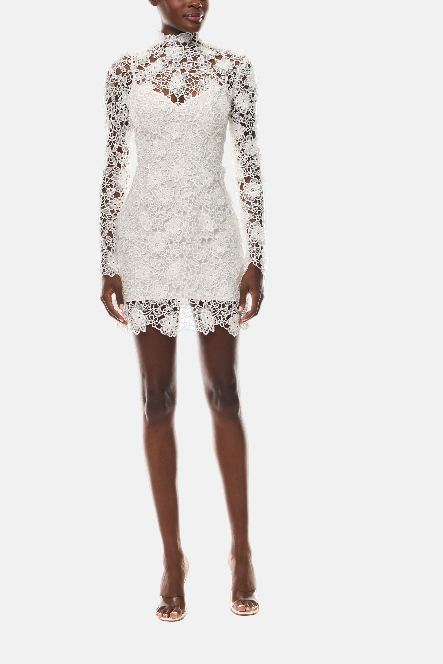 Monique Lhuillier Novi mini dress from The Bridal Edit - Silk White Guipure lace with long sleeves and high-neck - front.