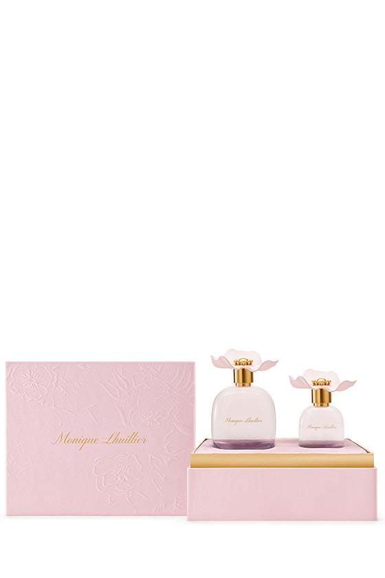 Eau de Parfum Gift Set - large and small floral perfume bottles in open floral box.