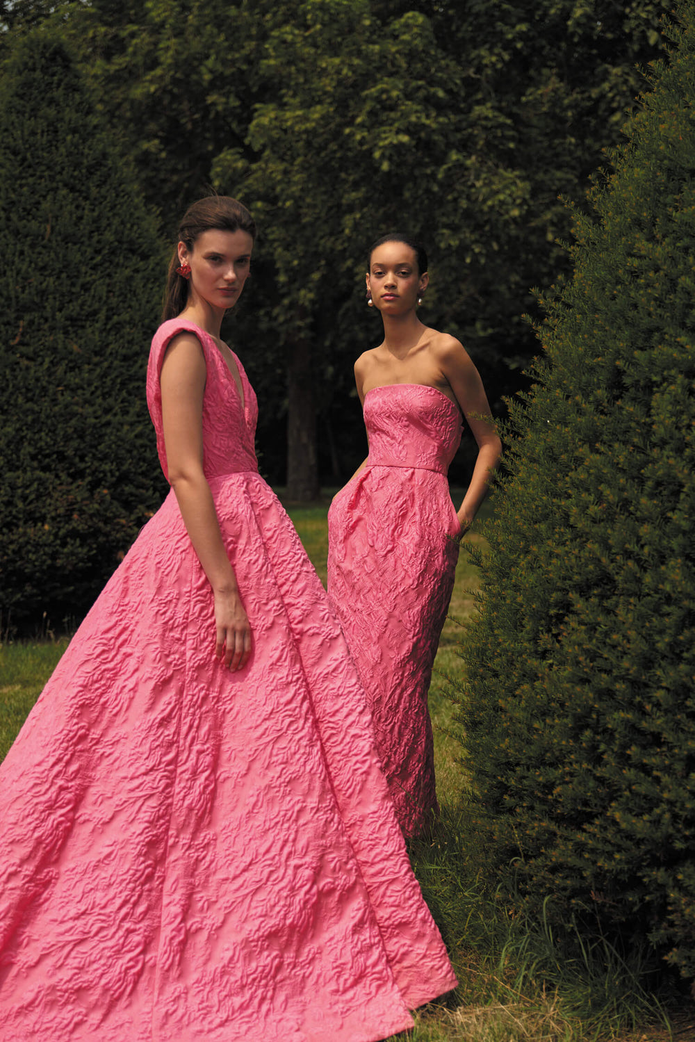 Monique Lhuillier Spring 2024 fuchsia jacquard ballgown and strapless dress.