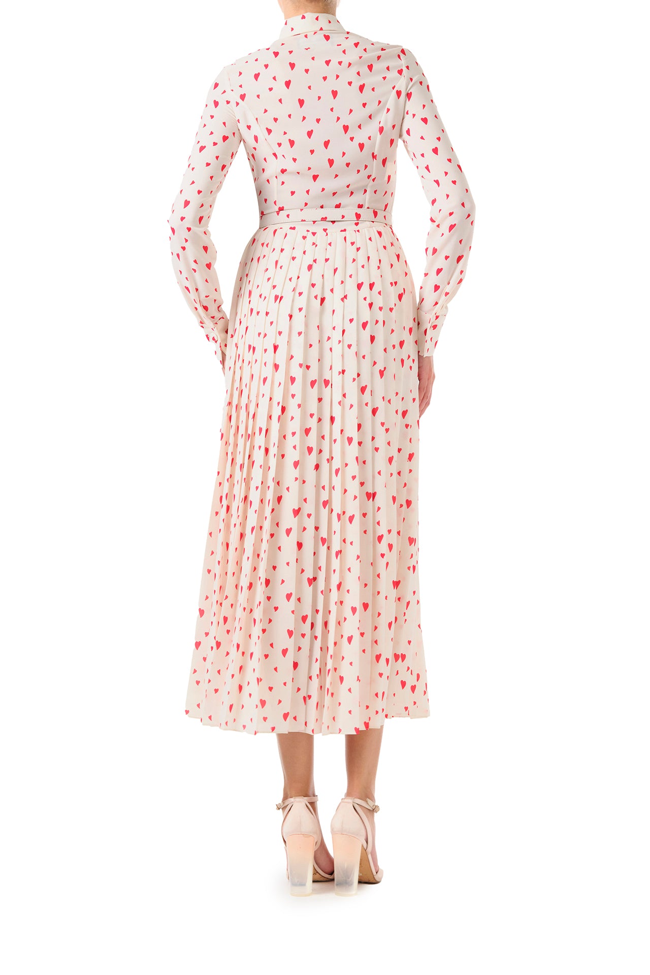 Monique Lhuillier Fall 2024 long sleeve, shirt dress with pleated skirt and belted waist in Heart Print Georgette. Collared neckline and button closure - back.