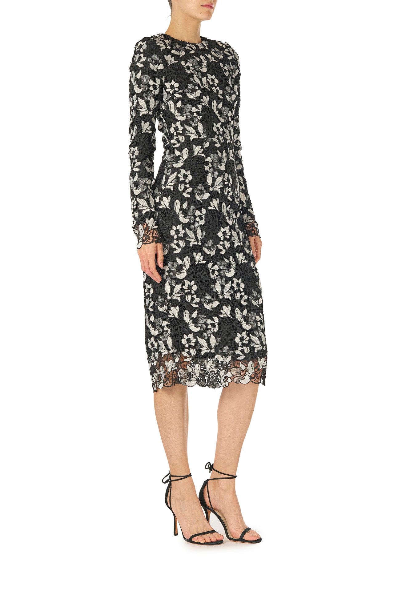 Monique Lhuillier Spring 2025 long sleeve sheath dress in noir silk white floral lace - side.