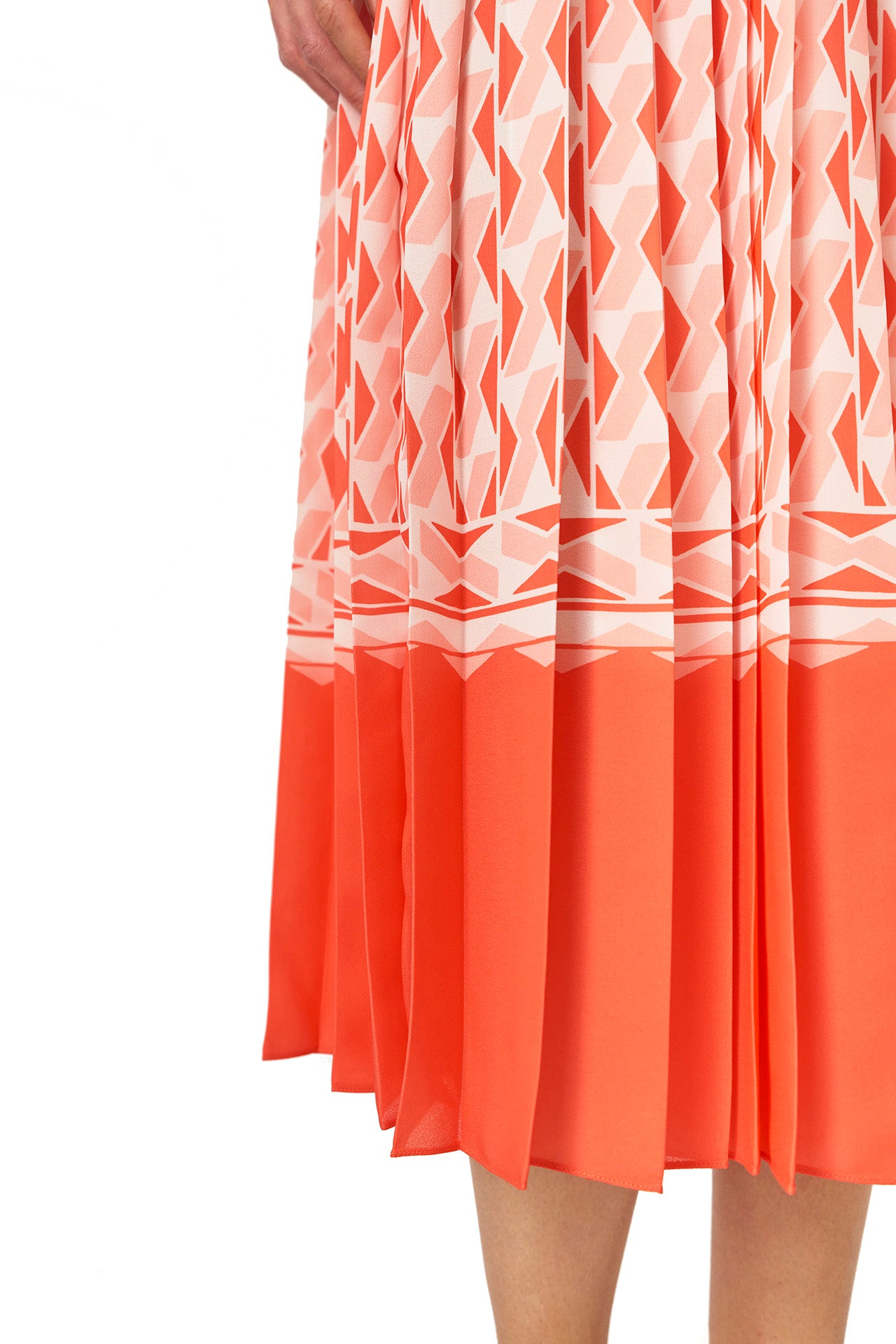 Monique Lhuillier Spring 2025 Long sleeve pleated button-down midi dress with collared neckline and belt at waist in Rosette colored Geo printed georgette fabric - hem line.