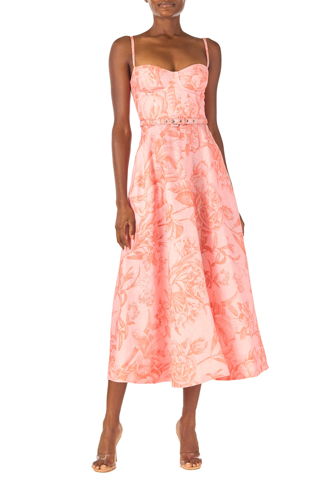 Monique Lhuillier Spring 2025 Floral printed a-line midi dress with spaghetti straps, corseted bodice and pockets in Rosette Coral colored linen - front.