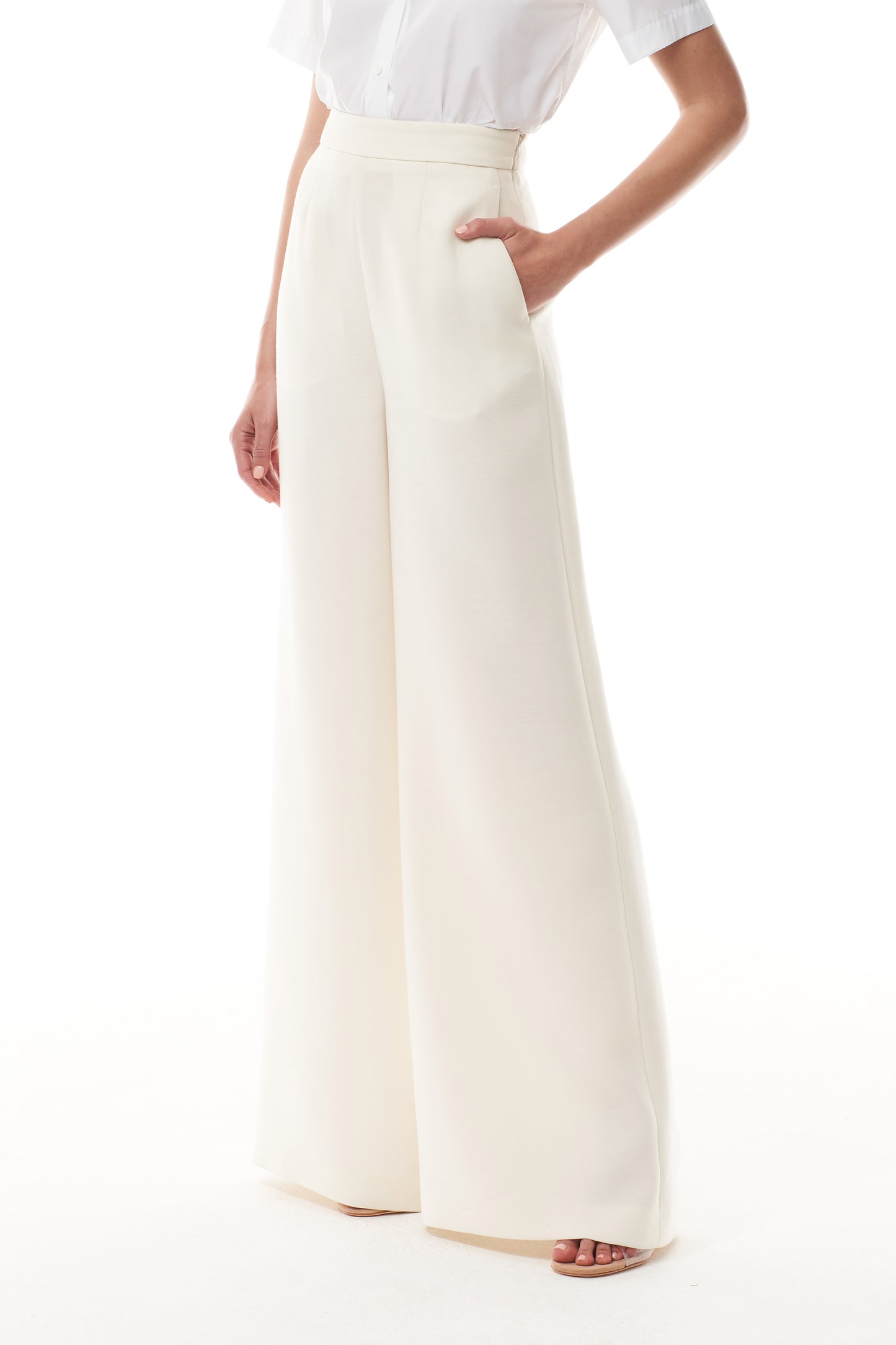Monique Lhuillier Spring 2025 wide leg palazzo trouser in silk white wool suiting - front.