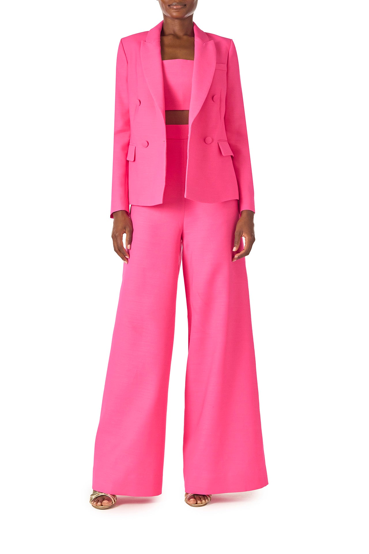 Monique Lhuillier Spring 2025 strapless bandeau in hibiscus wool-silk suiting fabric - front with palazzo trouser and double breasted jacket.