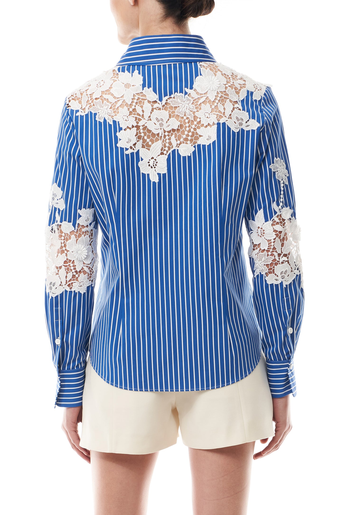 Monique Lhuillier Spring 2025 Long sleeve, button front collared striped shirt with lace detailing in Nautical Blue poplin with White lace details - back crop.
